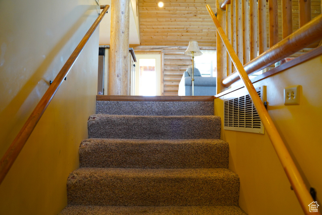 Stairway with rustic walls
