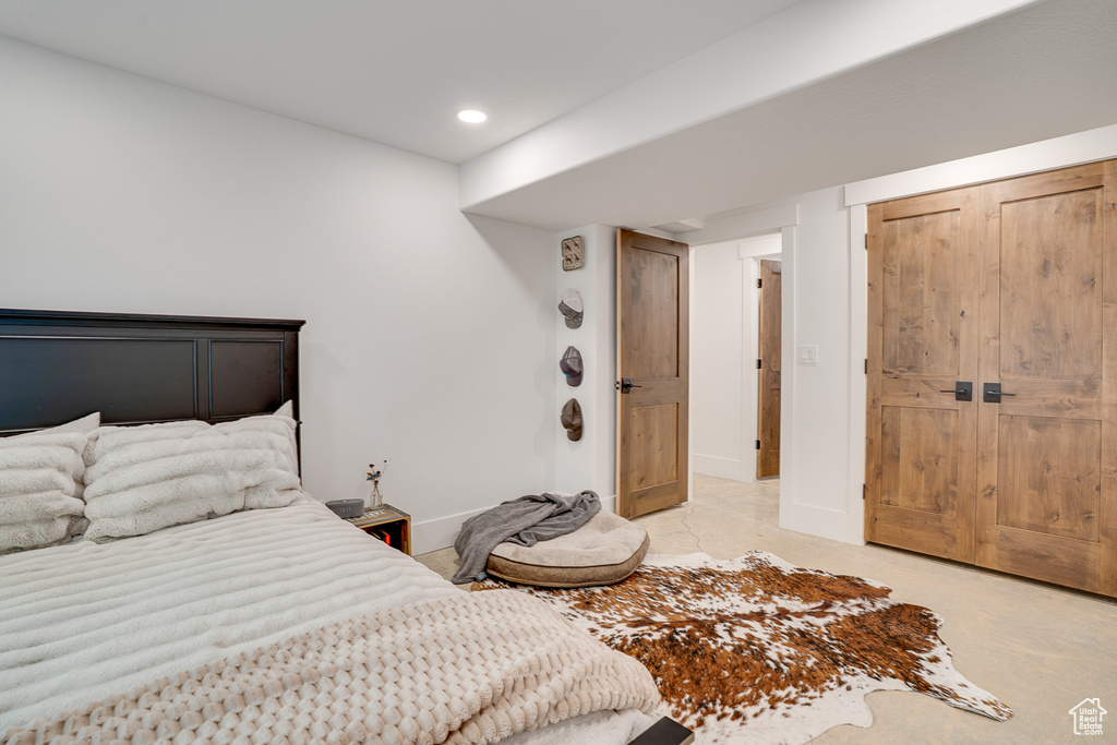 Bedroom featuring recessed lighting and baseboards