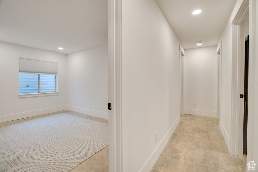 Hall featuring recessed lighting