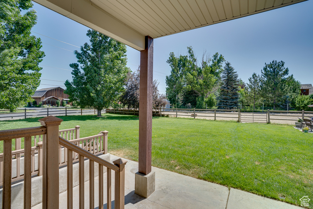 Fenced backyard with a patio area