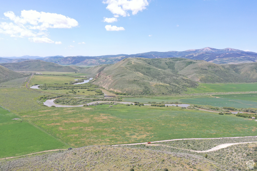 View of mountain background featuring a nearby body of water