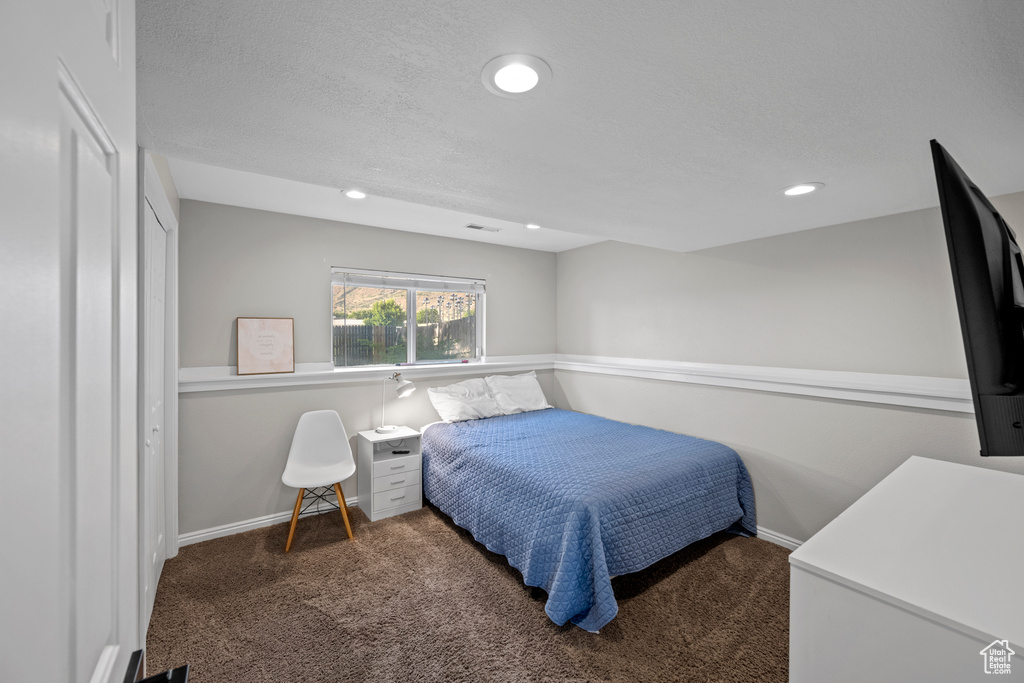 Bedroom with carpet flooring and recessed lighting