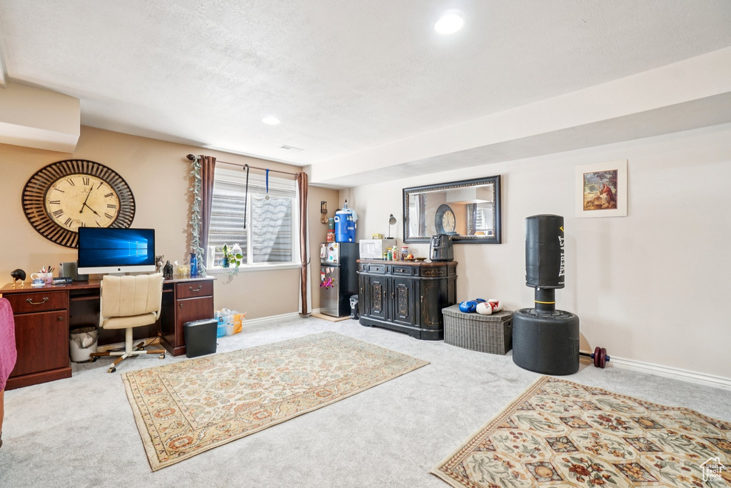 Office space featuring carpet and recessed lighting