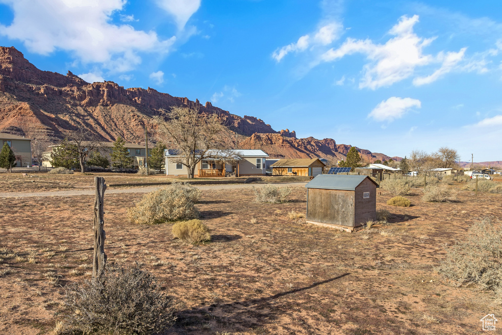 View of mountain background featuring nearby suburban area