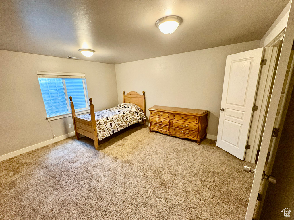 Bedroom featuring carpet flooring