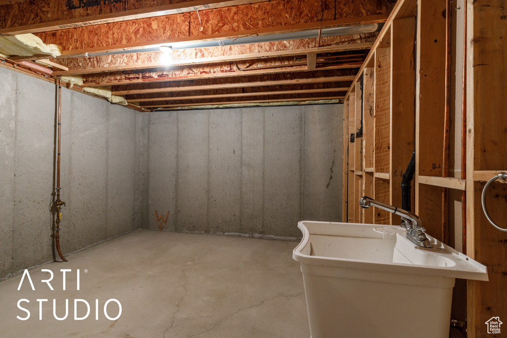 Below grade area featuring a sink