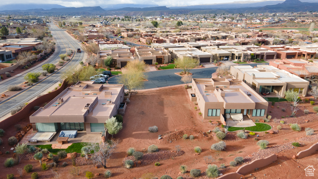 Aerial view of residential area with a mountainous background