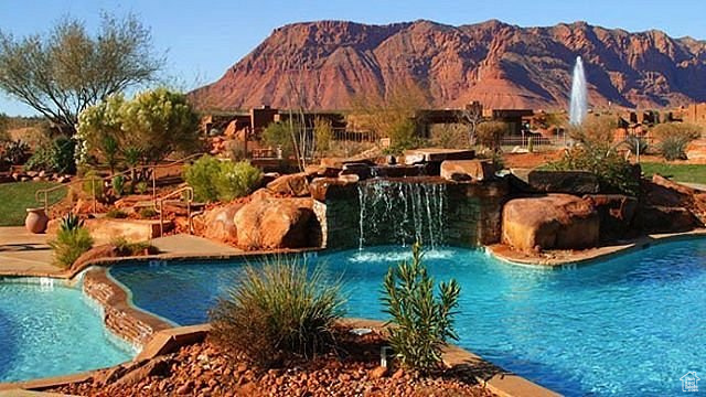 Community pool featuring a mountain view