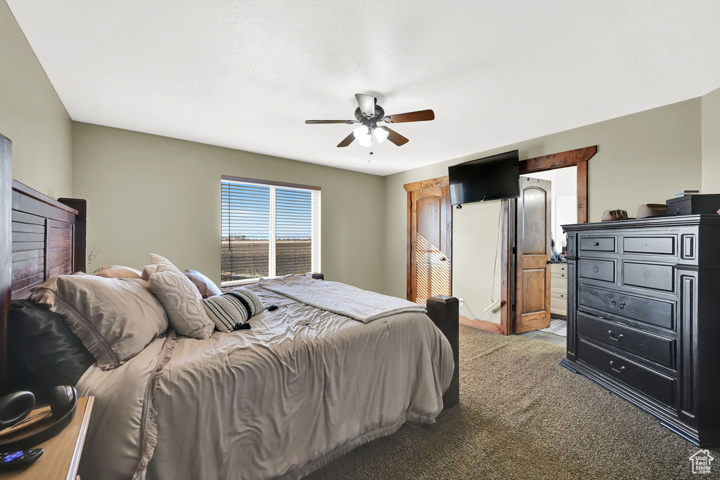 Bedroom featuring carpet flooring and ceiling fan