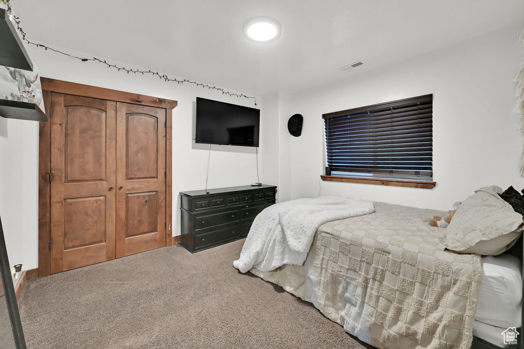 View of carpeted bedroom