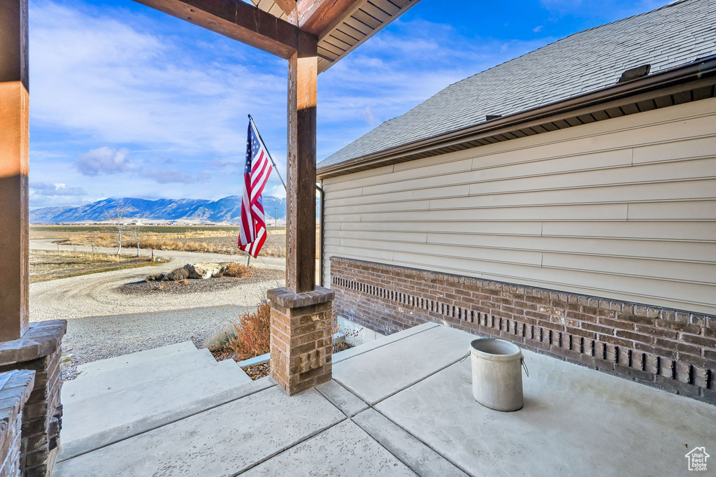 View of patio / terrace featuring a mountain view