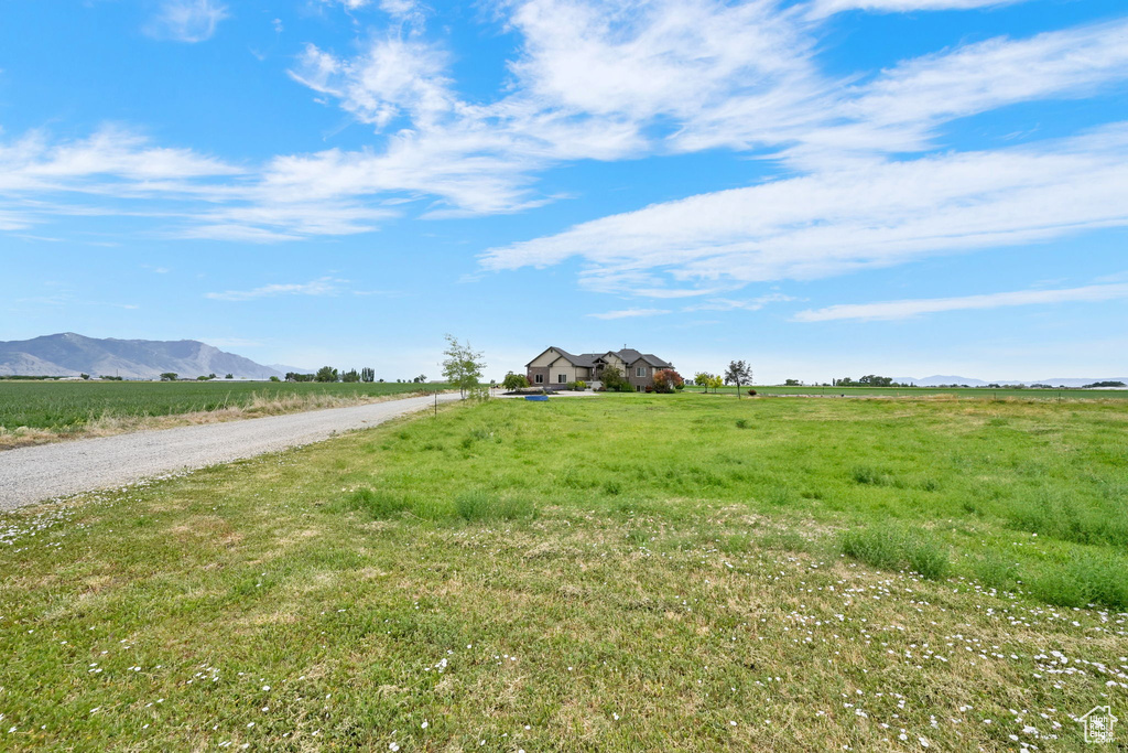 View of road featuring a view of rural / pastoral area and a mountain view