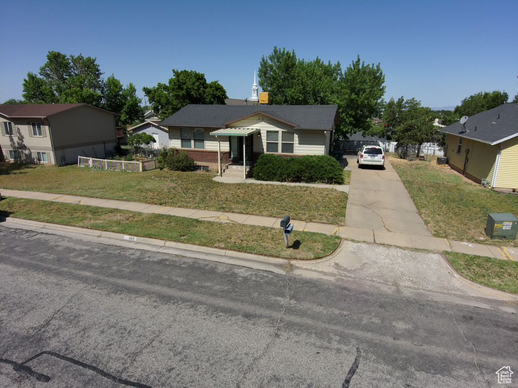 Bungalow-style house featuring driveway