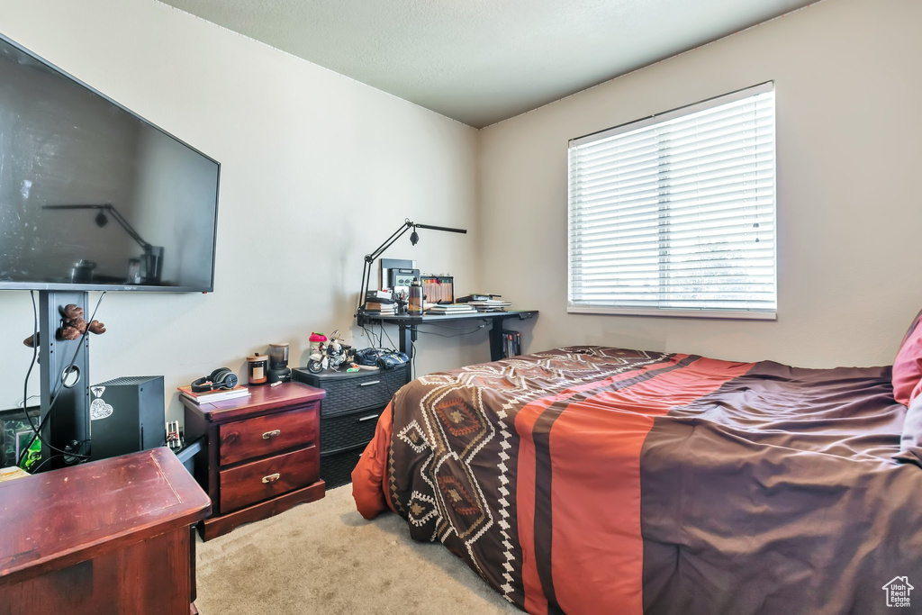 View of carpeted bedroom