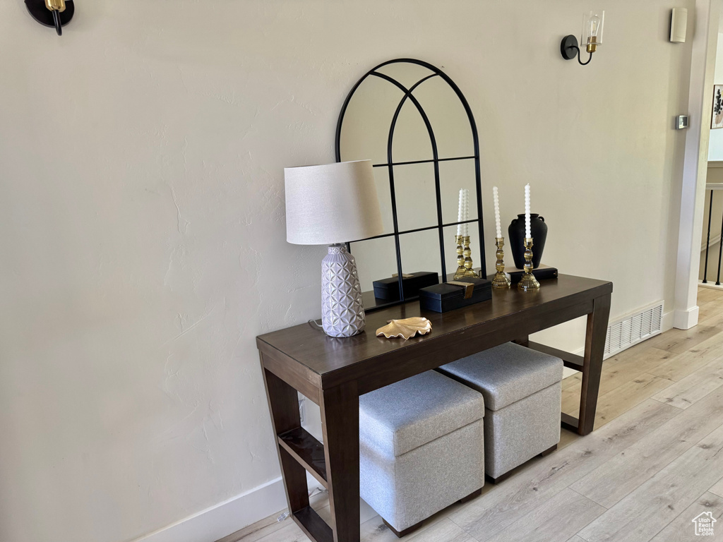 Detailed view of wood finished floors and baseboards