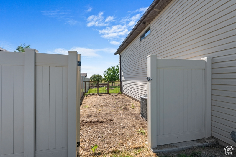 View of yard featuring a gate