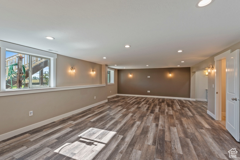 Spare room featuring wood finished floors and recessed lighting