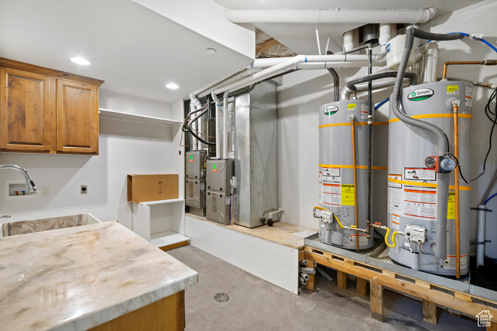 Utility room with gas water heater