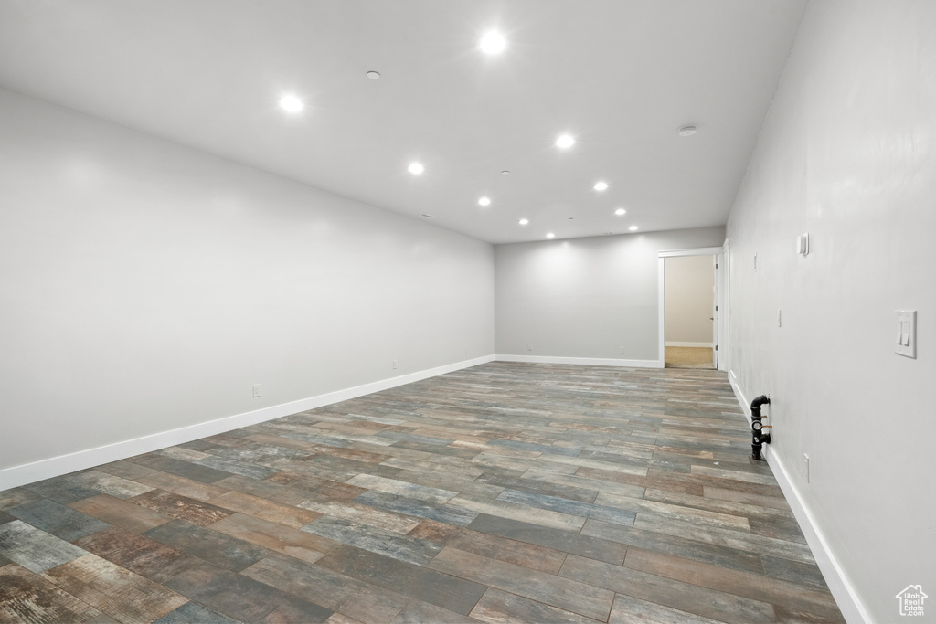 Empty room featuring recessed lighting and wood finished floors