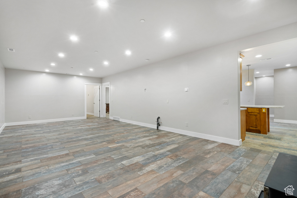 Spare room featuring light wood finished floors and recessed lighting