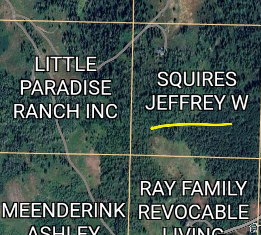 Aerial map of property and surrounding area featuring property boundaries highlighted