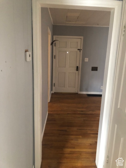 Corridor with wood finished floors