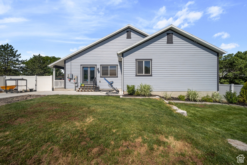 Back of property featuring a patio