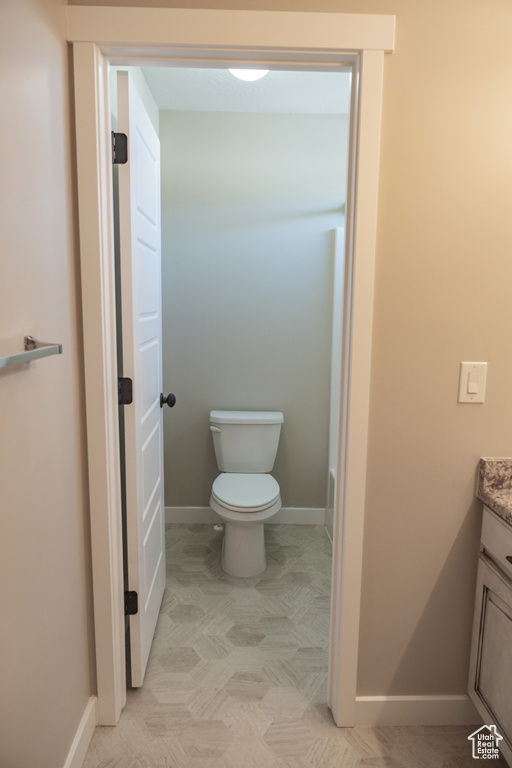 Bathroom with vanity and toilet