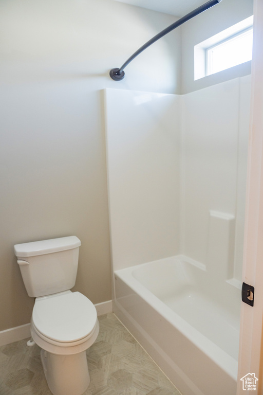 Bathroom with toilet and  shower combination