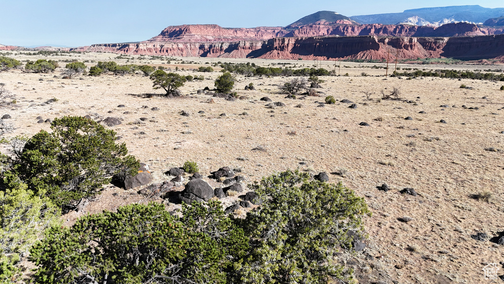 View of mountain backdrop with a desert landscape