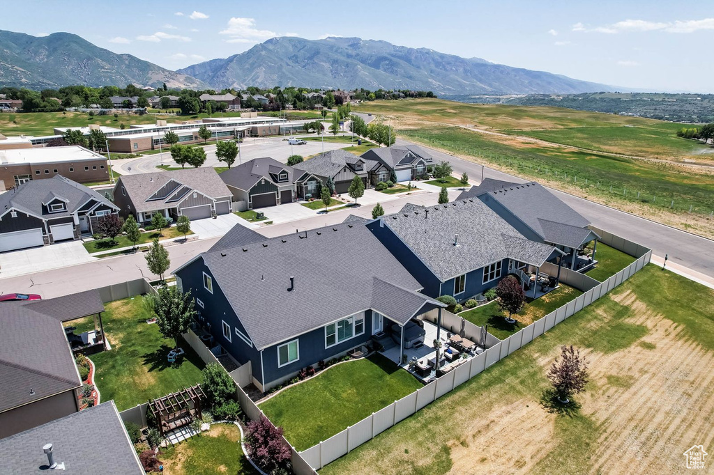 Aerial view of residential area with a mountain backdrop