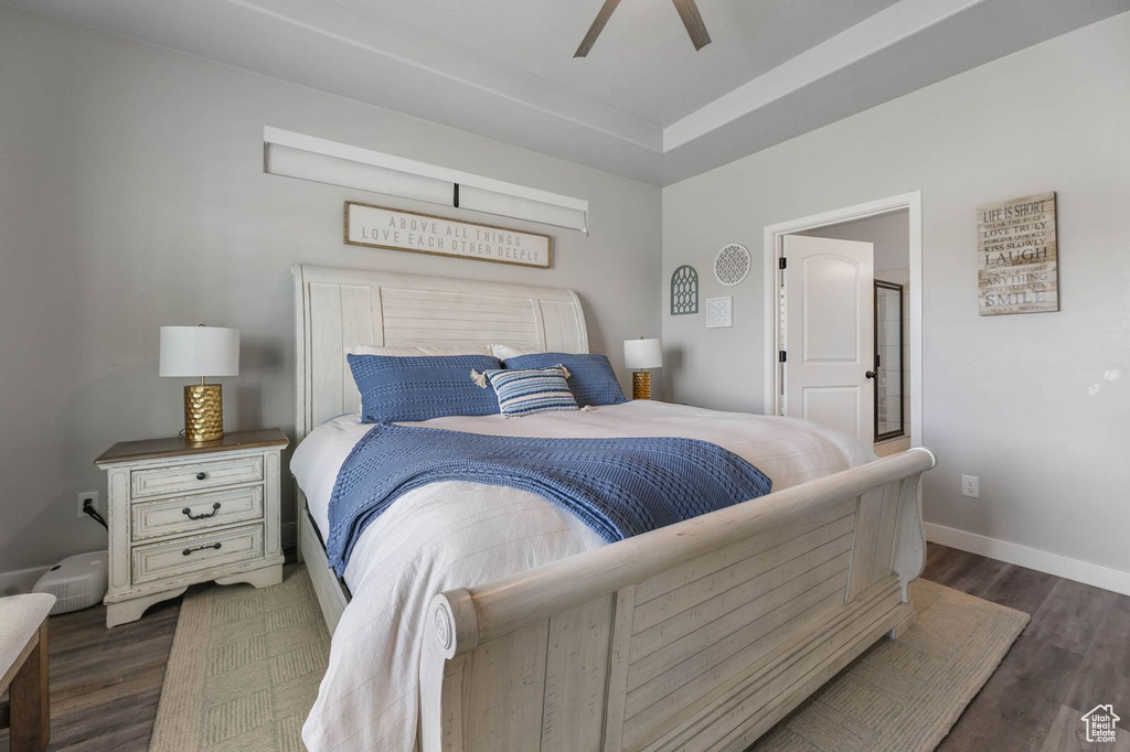 Bedroom featuring wood finished floors and ceiling fan