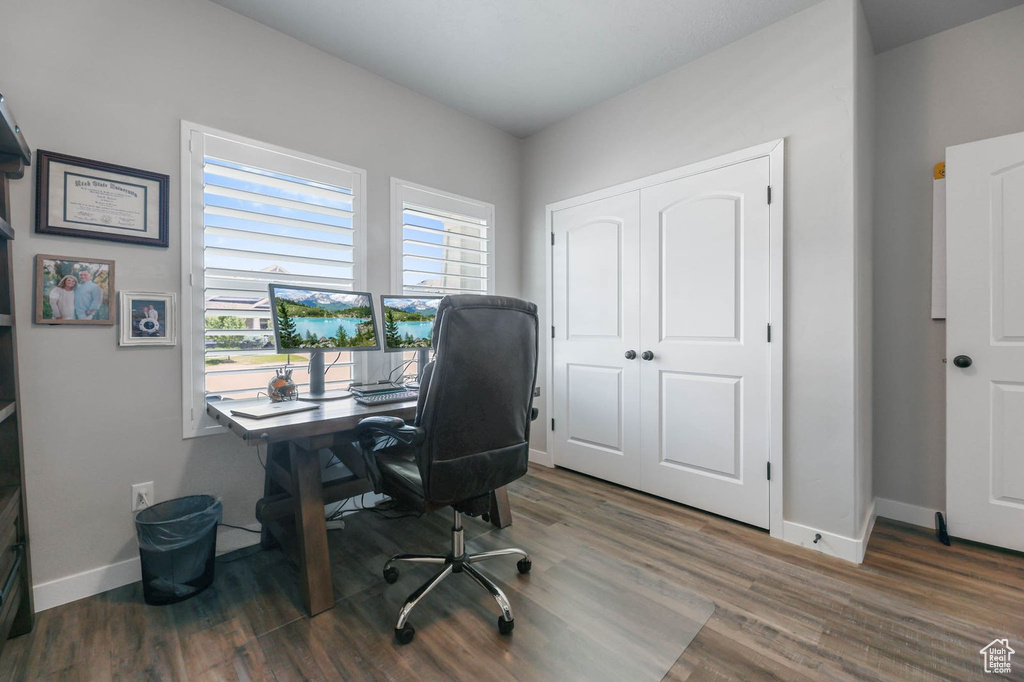 Office space with wood finished floors