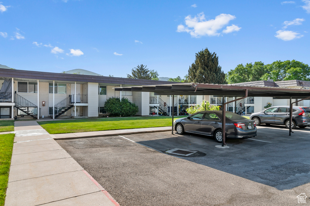 Covered parking lot featuring stairway