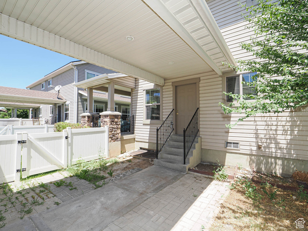 View of patio / terrace with a gate and entry steps