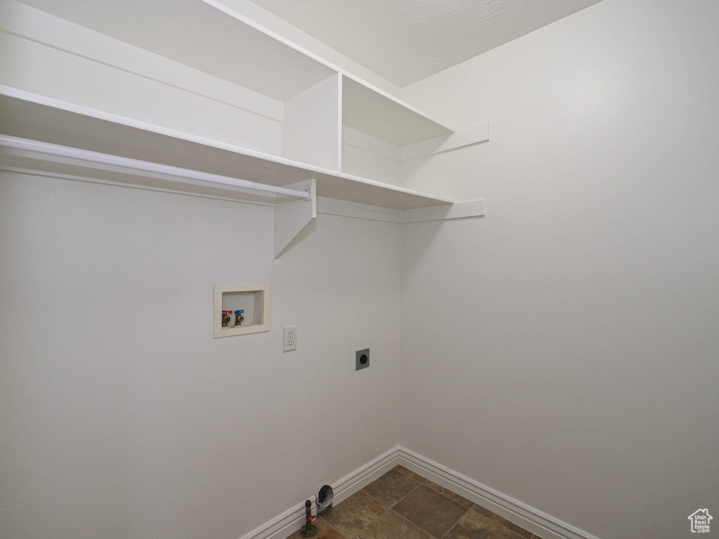 Laundry area featuring hookup for a washing machine, hookup for an electric dryer, and hookup for a gas dryer