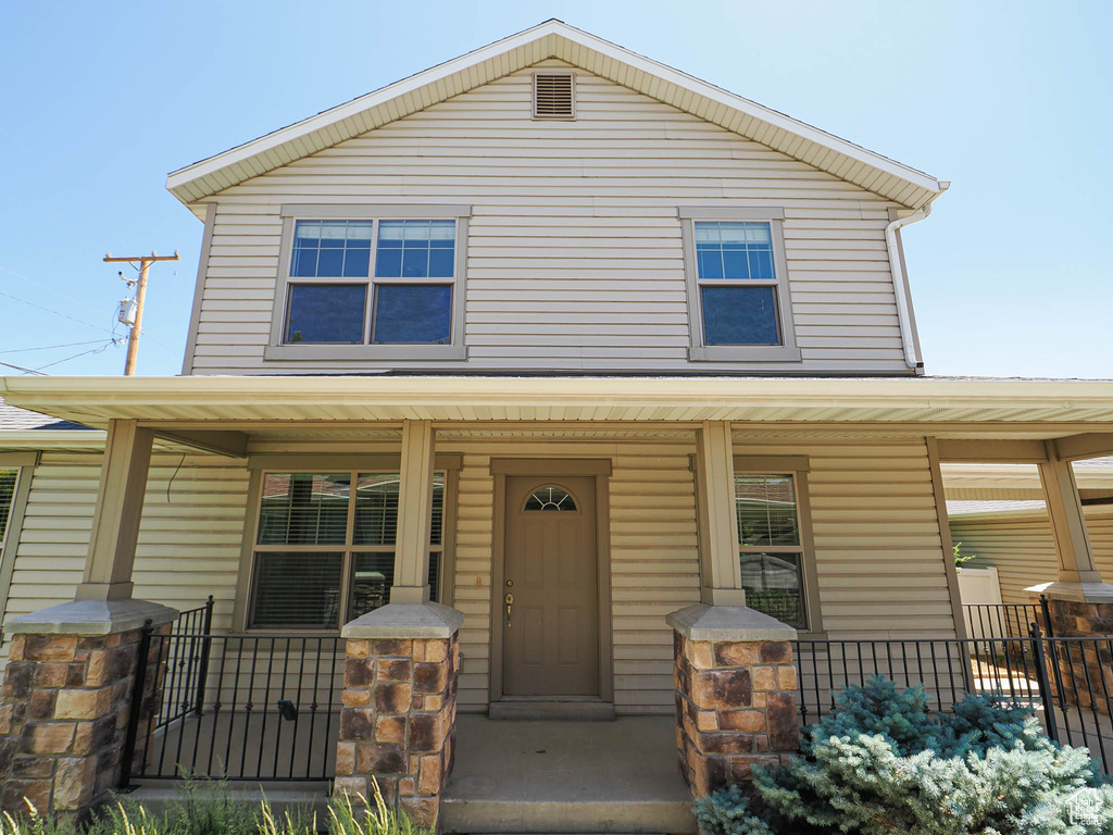 View of front of property with a porch