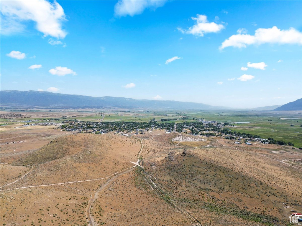 Aerial view of sparsely populated area with mountains