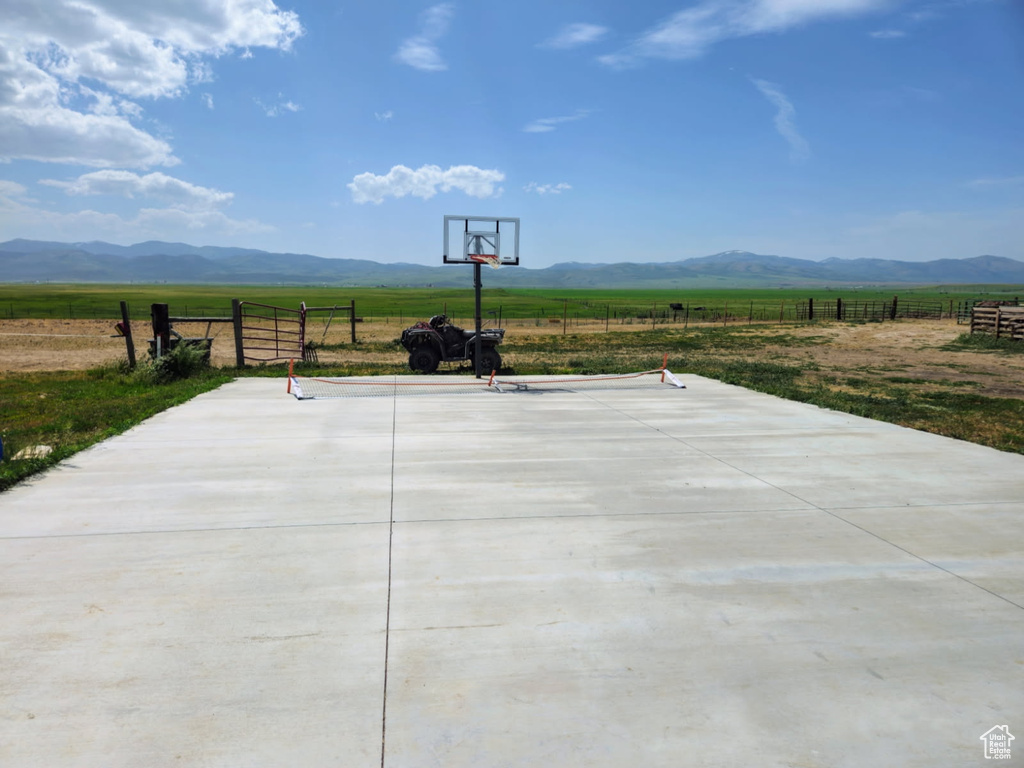 View of patio with a view of rural / pastoral area and a mountain view