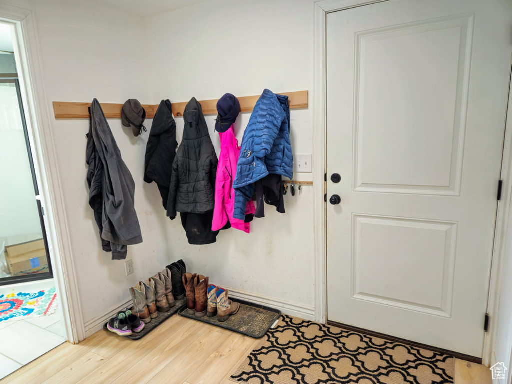 Mudroom featuring wood finished floors