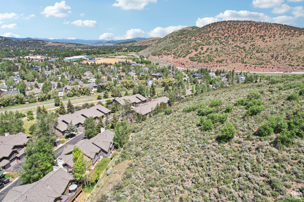 View of mountain background featuring nearby suburban area