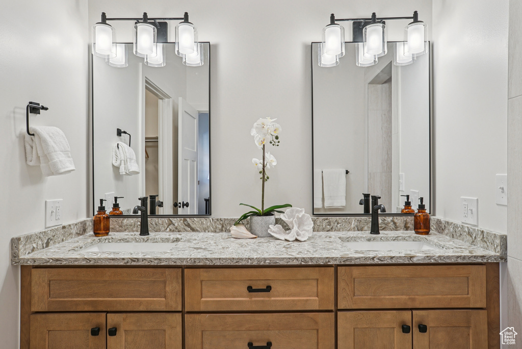 Bathroom featuring double vanity