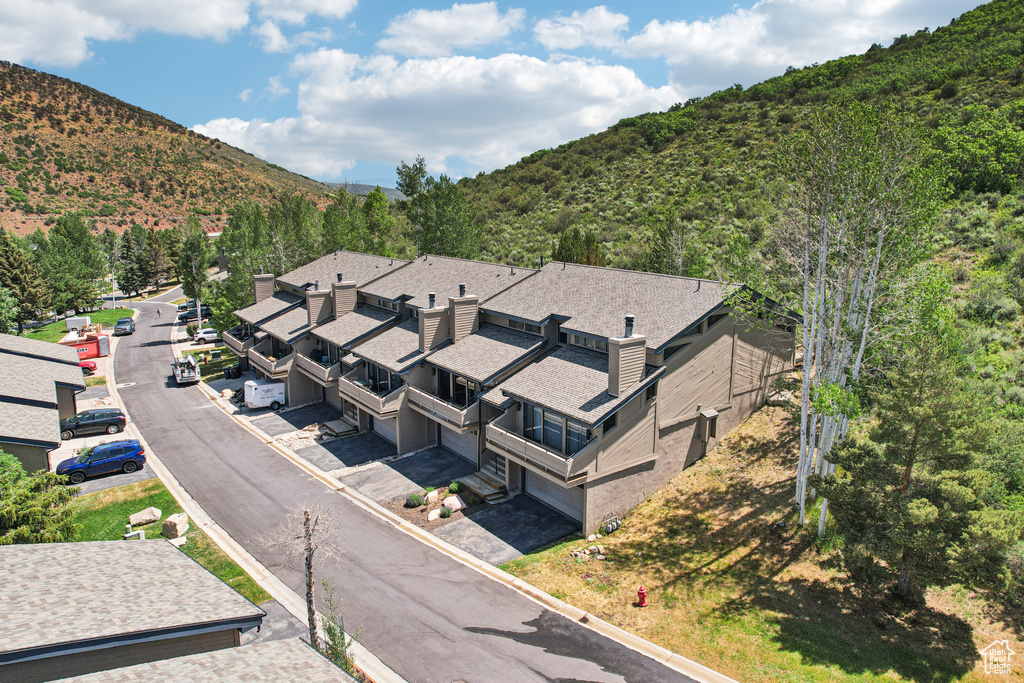 Aerial view of residential area with mountains