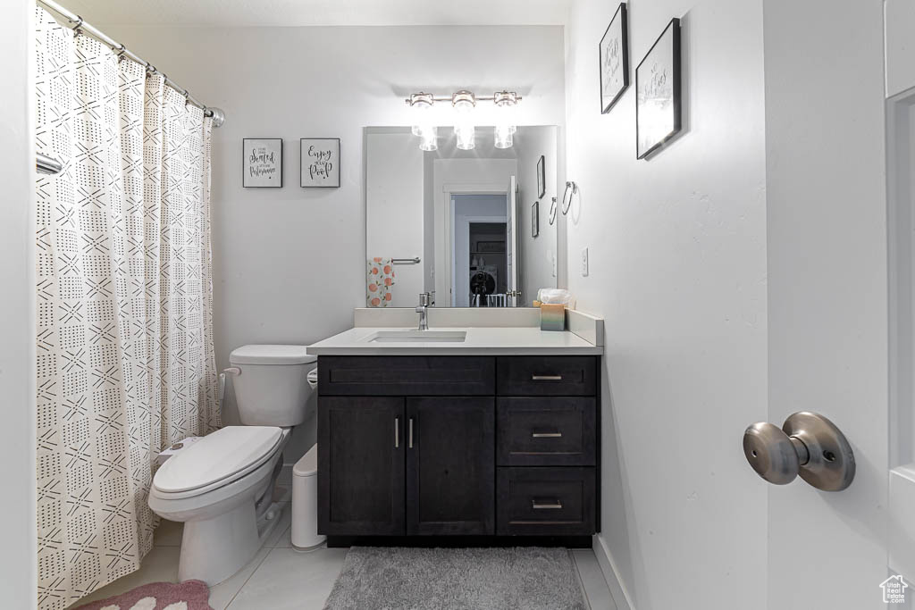 Full bath with vanity, tile patterned flooring, and a shower with curtain