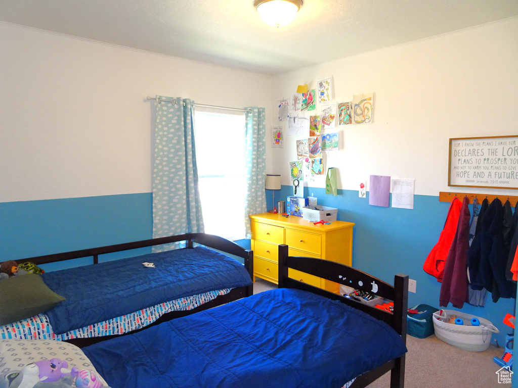 Bedroom featuring carpet flooring