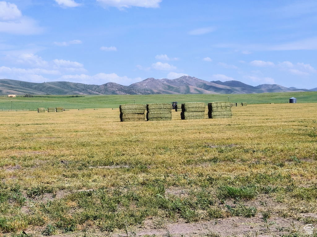 View of mountain backdrop featuring rural landscape