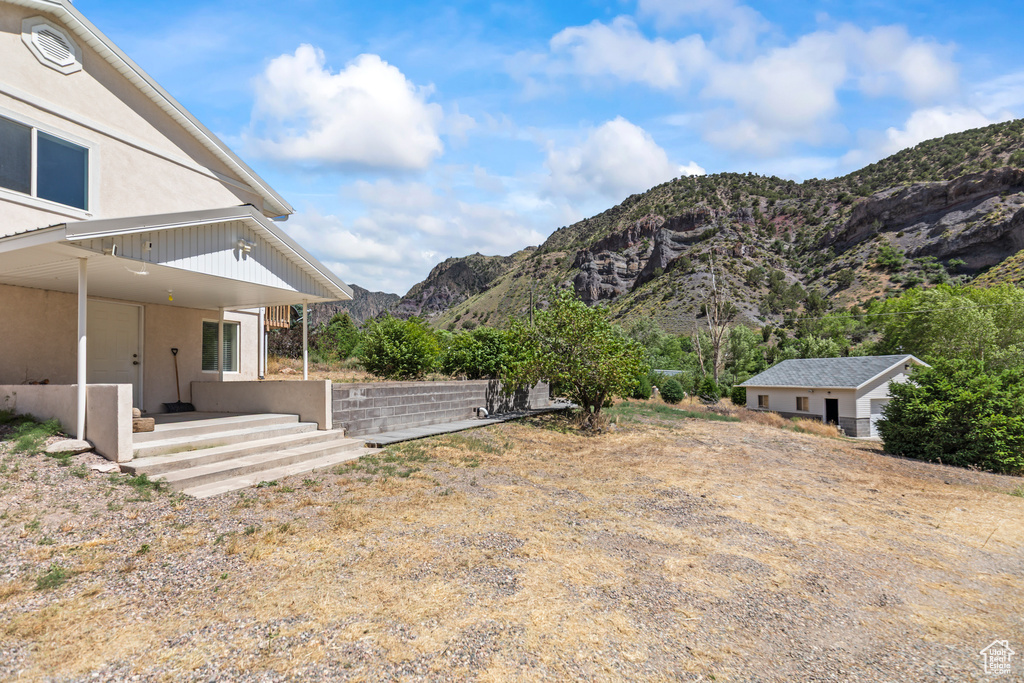 View of yard with a mountain view