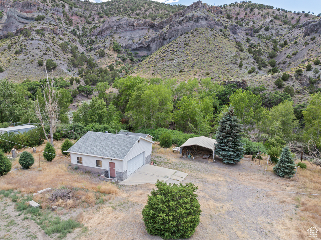 View from above of property featuring a mountain backdrop