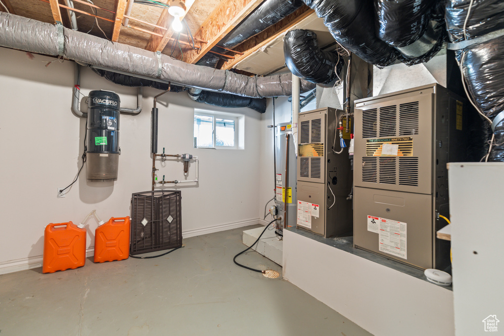 Utility room featuring a central vacuum unit