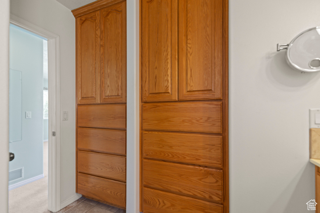 Bathroom featuring baseboards and vanity